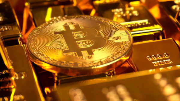 Золото обновило максимум пока падал биткоин